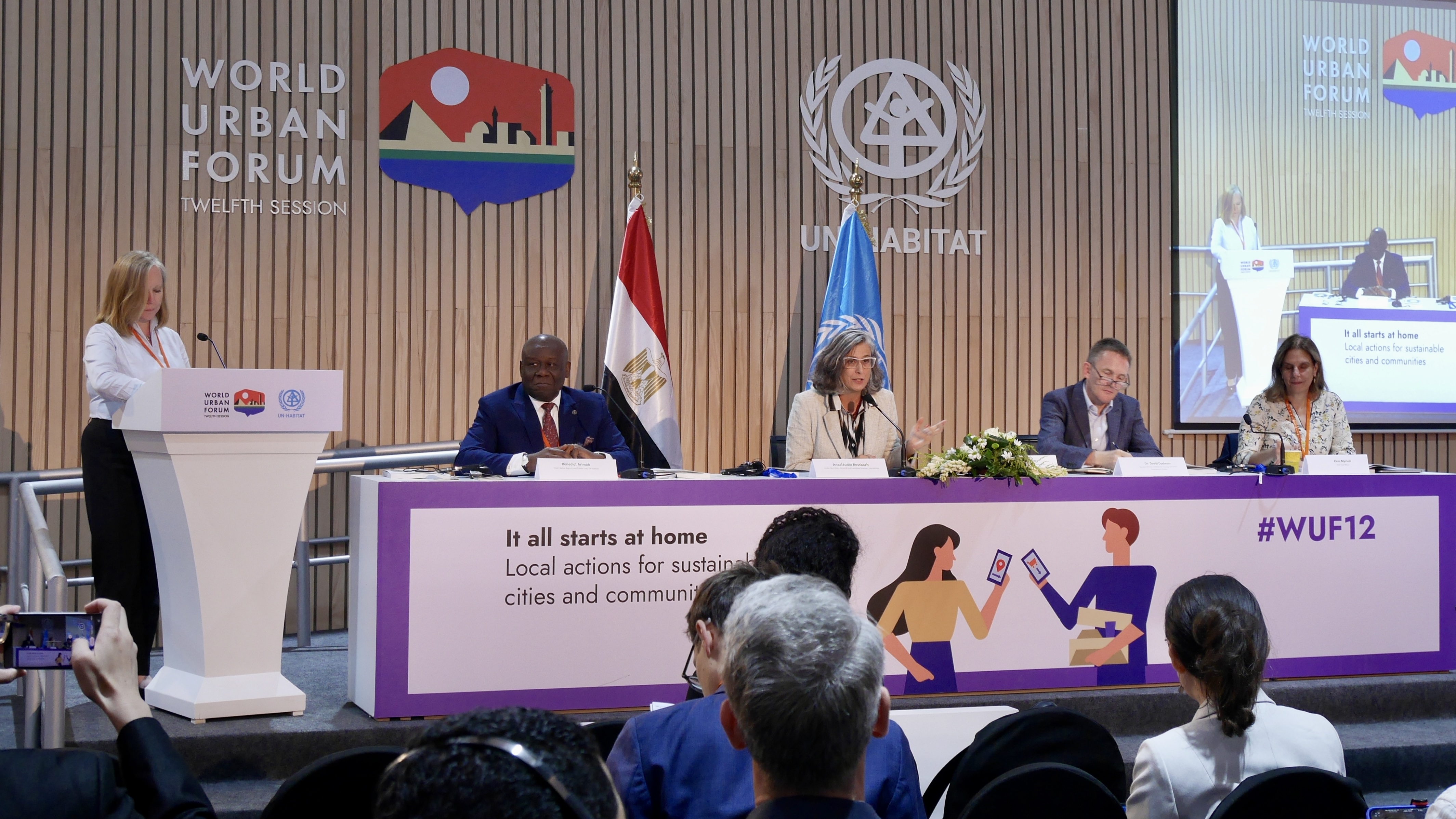 UN-Habitat Executive Director (middle) launched the World Cities Report during WUF12 © UN-Habitat/Tiffany Chui